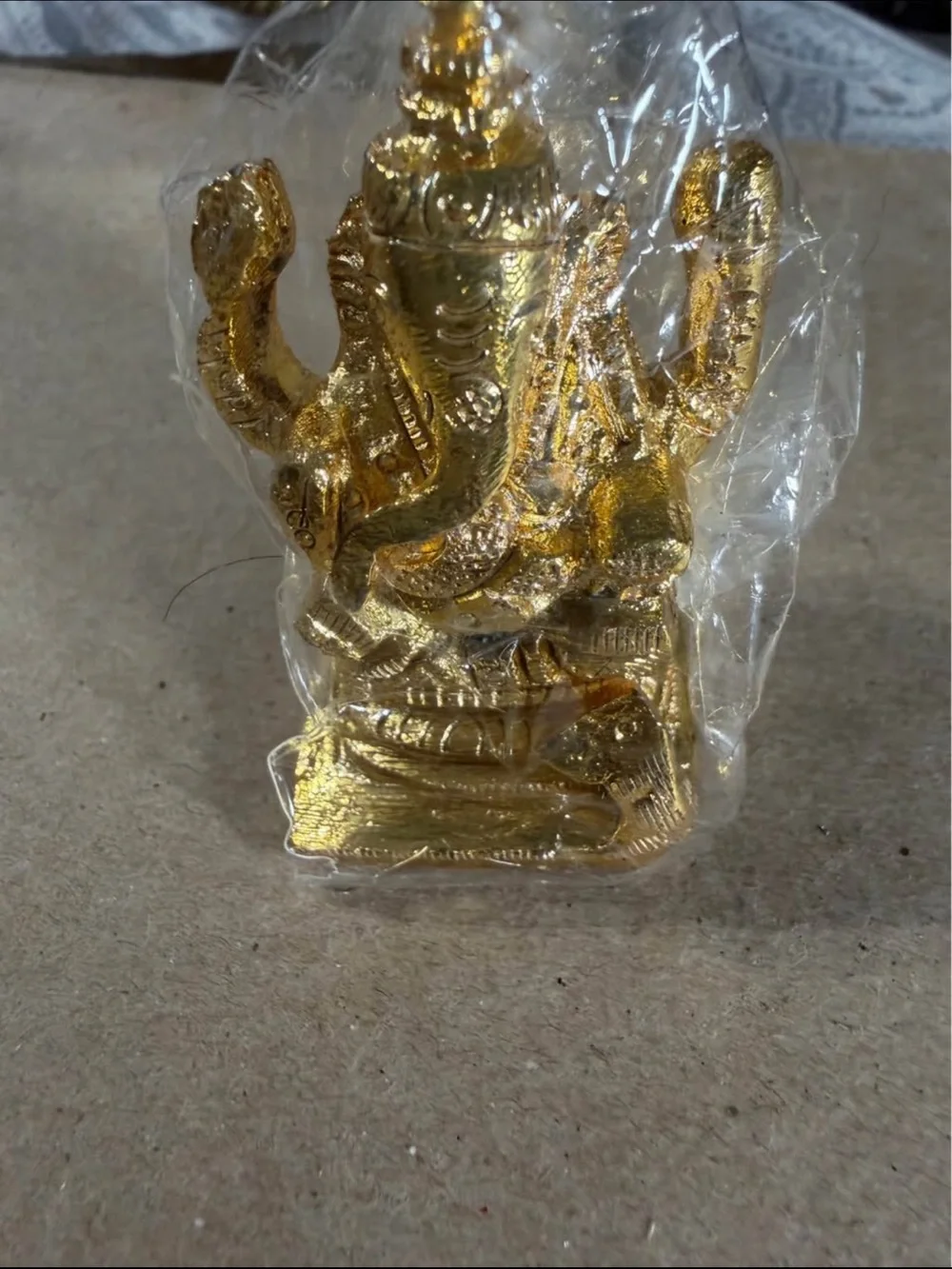 Golden ganesh Statue - new in package small size metal